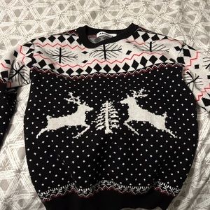 Holiday reindeer sweater used but in great condition since it’s seasonal!